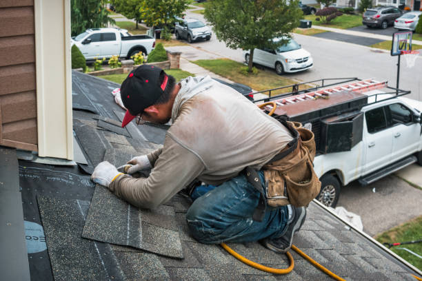 Professional Gutter Repair And Installation technician working in Elkhart, KS